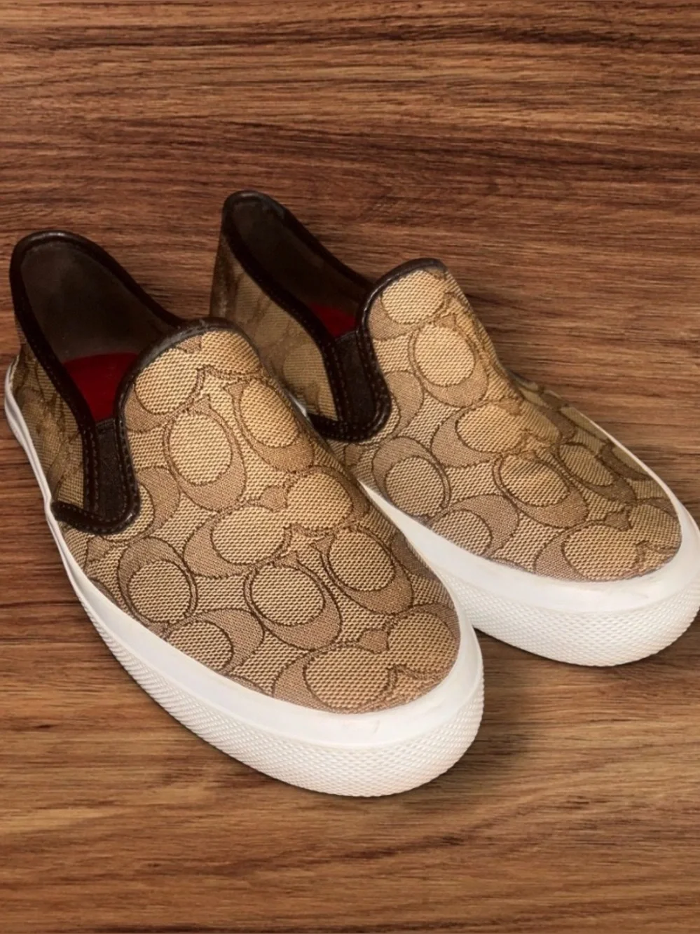 Coach Chrissy slip-on sneakers in the signature brown jacquard canvas